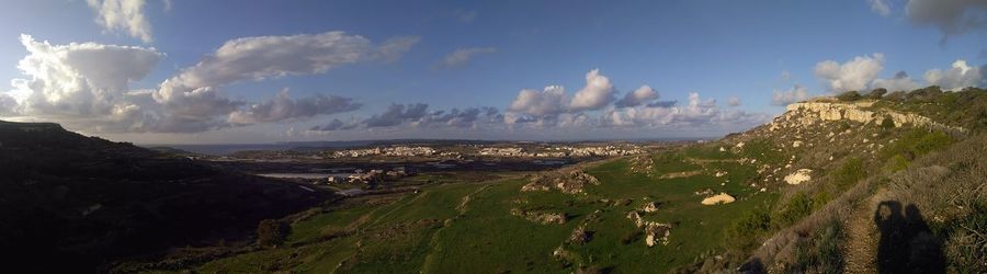 Panoramic view of beach against sky