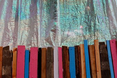 High angle view of colorful wood arranged on table