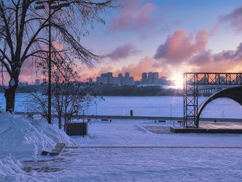 Bridge over river during sunset