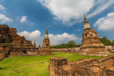 Old temple of ayutthaya building under blue sky