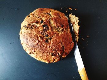 Close-up of bread on black background