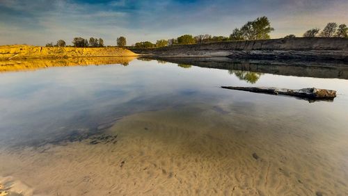 Scenic view of beach against sky