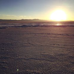 Scenic view of landscape against sky during sunset