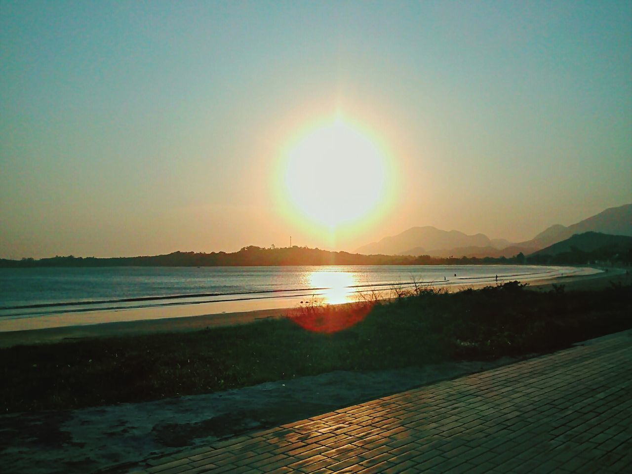 sun, water, sunset, tranquil scene, scenics, tranquility, beauty in nature, sunlight, sea, reflection, beach, sunbeam, clear sky, nature, lens flare, idyllic, shore, lake, sky, copy space