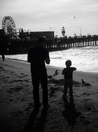 Woman standing at seaside