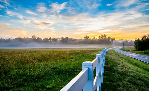 Scenic view of landscape against sky during sunset