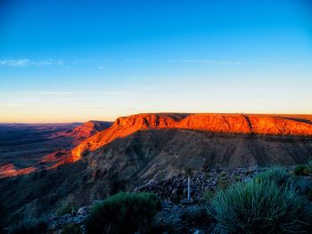 Scenic view of mountain against sky during sunset