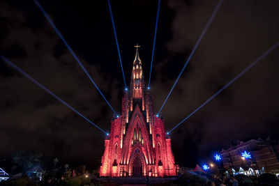 Low angle view of illuminated cathedral at night