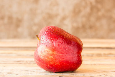 Close-up of apple on table