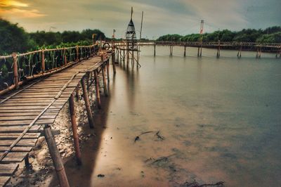 Bridge over river against sky