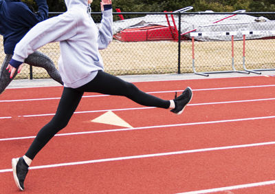 Full length of man running on floor