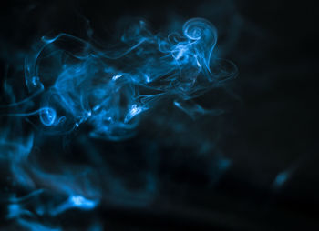 Close-up of smoke against black background