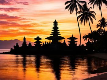 Low angle view of silhouette trees against sky during sunset