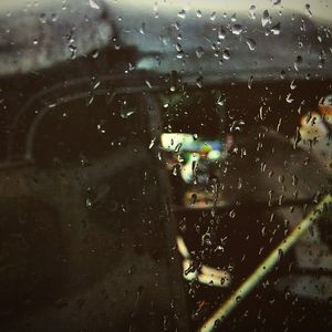Full frame shot of wet car window