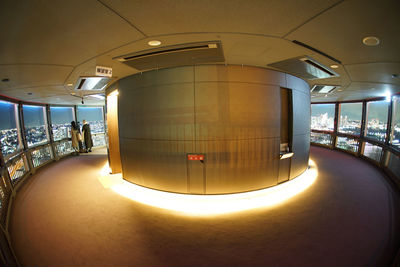 Interior of illuminated railroad station