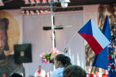 Rear view of people walking outdoors