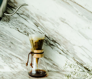 Close-up of wine glass on table
