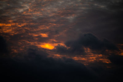 Low angle view of dramatic sky during sunset