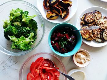 High angle view of salad in bowls on table