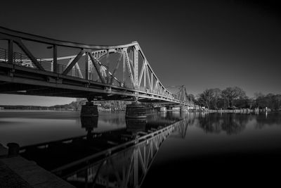 Bridge over river against sky