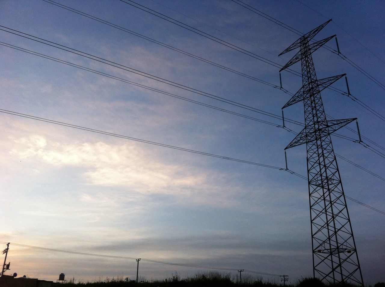 power line, electricity pylon, power supply, electricity, fuel and power generation, connection, sky, low angle view, cable, technology, silhouette, cloud - sky, power cable, dusk, cloud, nature, tranquility, sunset, outdoors, no people