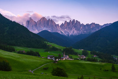 Scenic view of landscape and mountains against sky