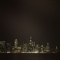 Illuminated cityscape at night