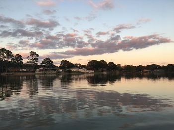 View of calm lake at sunset