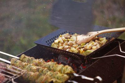 Close-up of food on barbecue