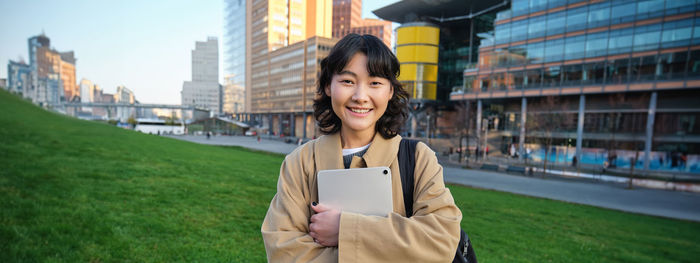 Young woman using mobile phone