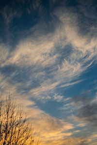 Low angle view of dramatic sky during sunset