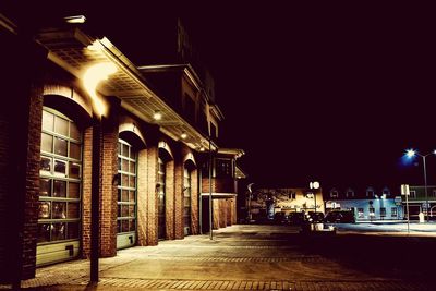 Illuminated buildings in city at night