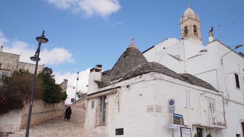 Low angle view of church against blue sky