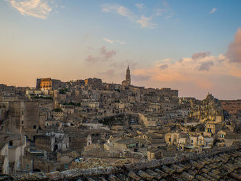 Townscape against sky during sunset. matera, italy