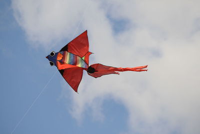 Low angle view of flag against sky