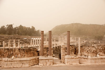 Ruins of temple against clear sky