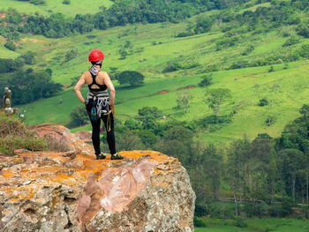 Full length of man standing on rock