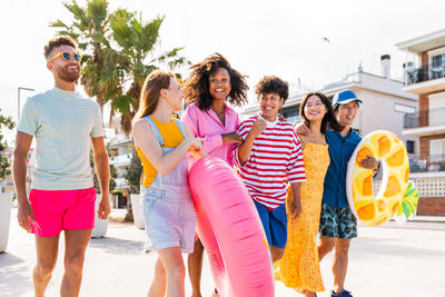 Group of friends standing on street