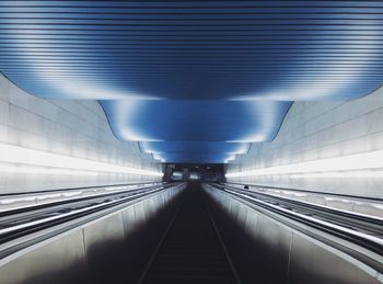 Empty illuminated escalator