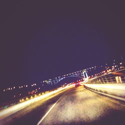 Light trails on road at night