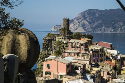 Panoramic view of buildings and sea against sky