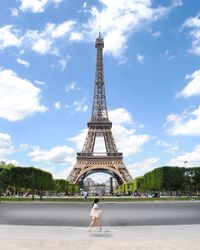 View of tower against cloudy sky