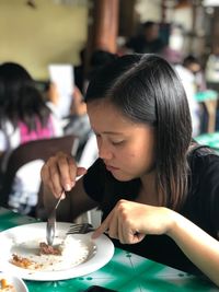 Portrait of woman in restaurant