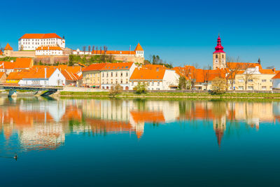 Reflection of buildings in lake