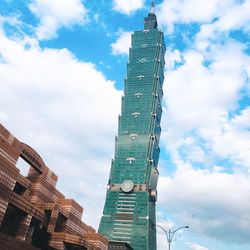 Low angle view of modern buildings against sky