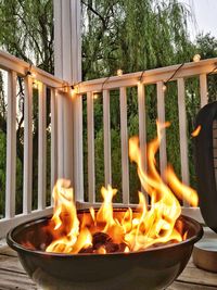 Close-up of fire on railing