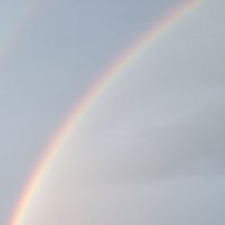 Low angle view of rainbow