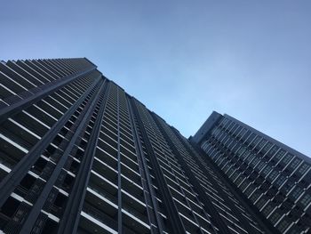 Low angle view of modern buildings against clear sky