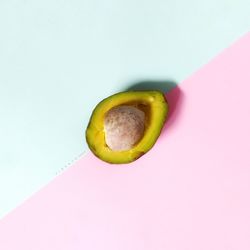 Close-up of fruit against white background