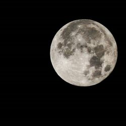 Low angle view of moon in sky